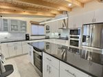 Sleek kitchen with tons of storage, great stainless appliances